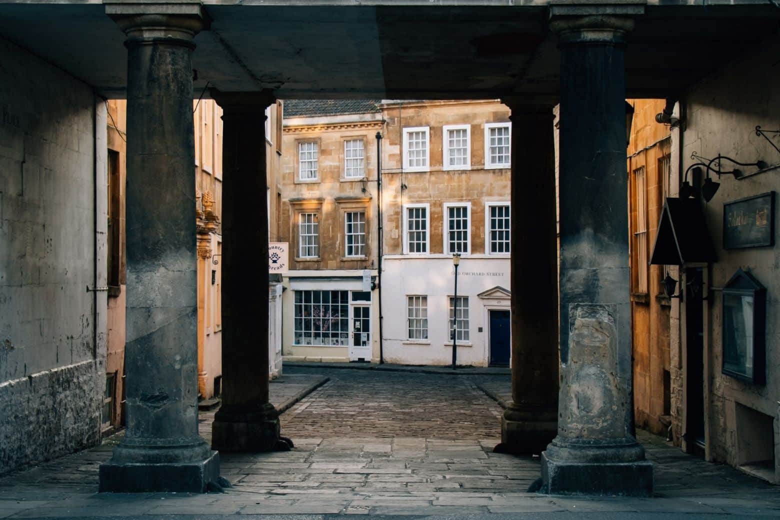 Old houses and columns in Bath, Uk