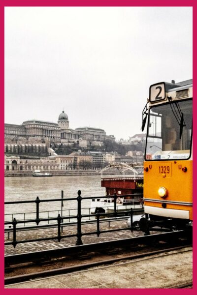 Budapest tram, the Danube and Buda Castle in the distance in winter